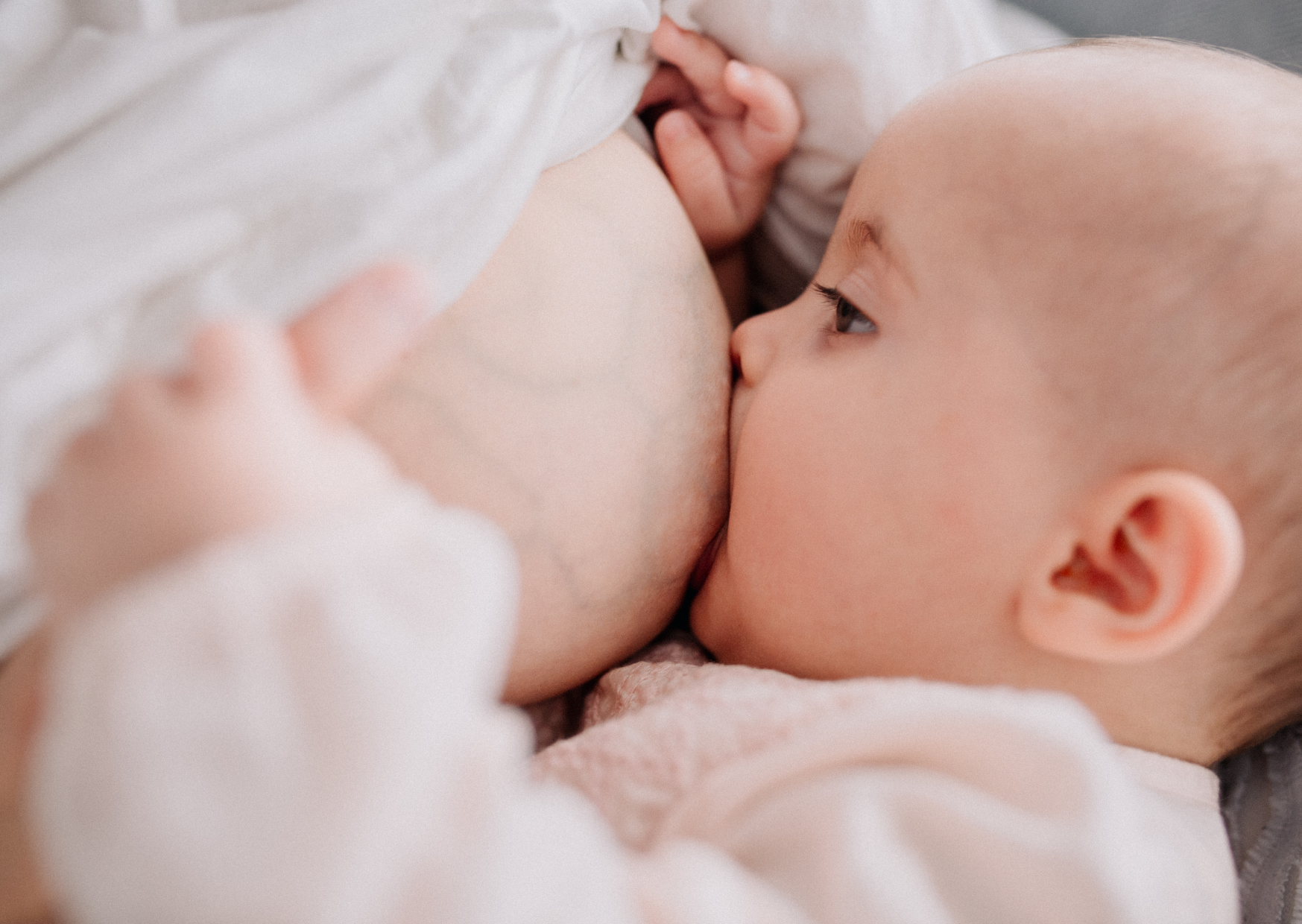 tepelcreme, een afbeelding van een baby aan de borst